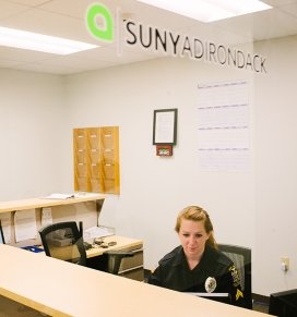 Campus security officer Megan is seen in the security office
