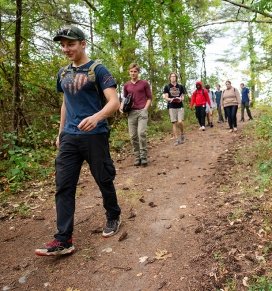 A class undergoes Leave No Trace training in the trails on the college's Queensbury campus.