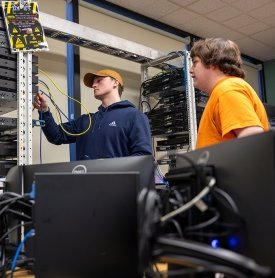 Two students work on a networking project at SUNY Adirondack Saratoga.
