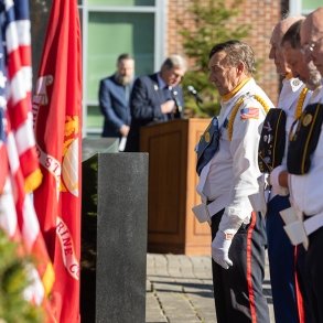 Veterans participate in a ceremony at SUNY Adirondack