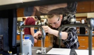 A student works in the Chemistry lab