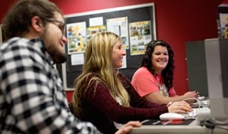 Students work collaboratively in a Media Arts class