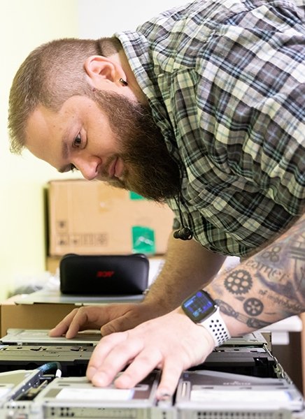 Brenden Sullivan works on a computer at SUNY Adirondack