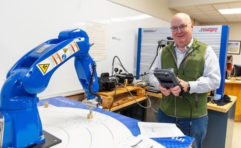 Professor Jeff Clark is seen in an on-campus robotics lab