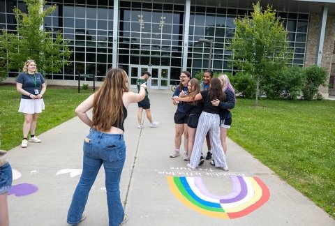 Upward Bound students are shown in an activity outside the Residence Hall